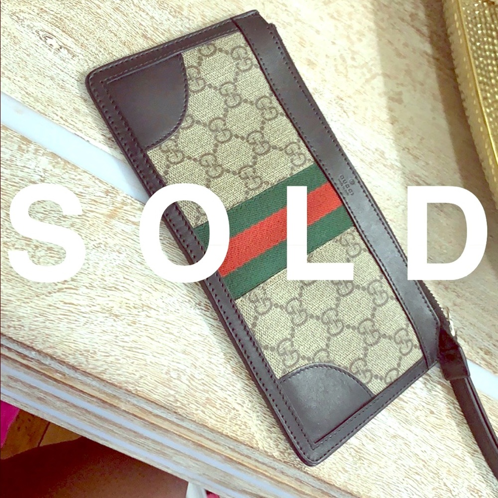 Gucci wristlet.